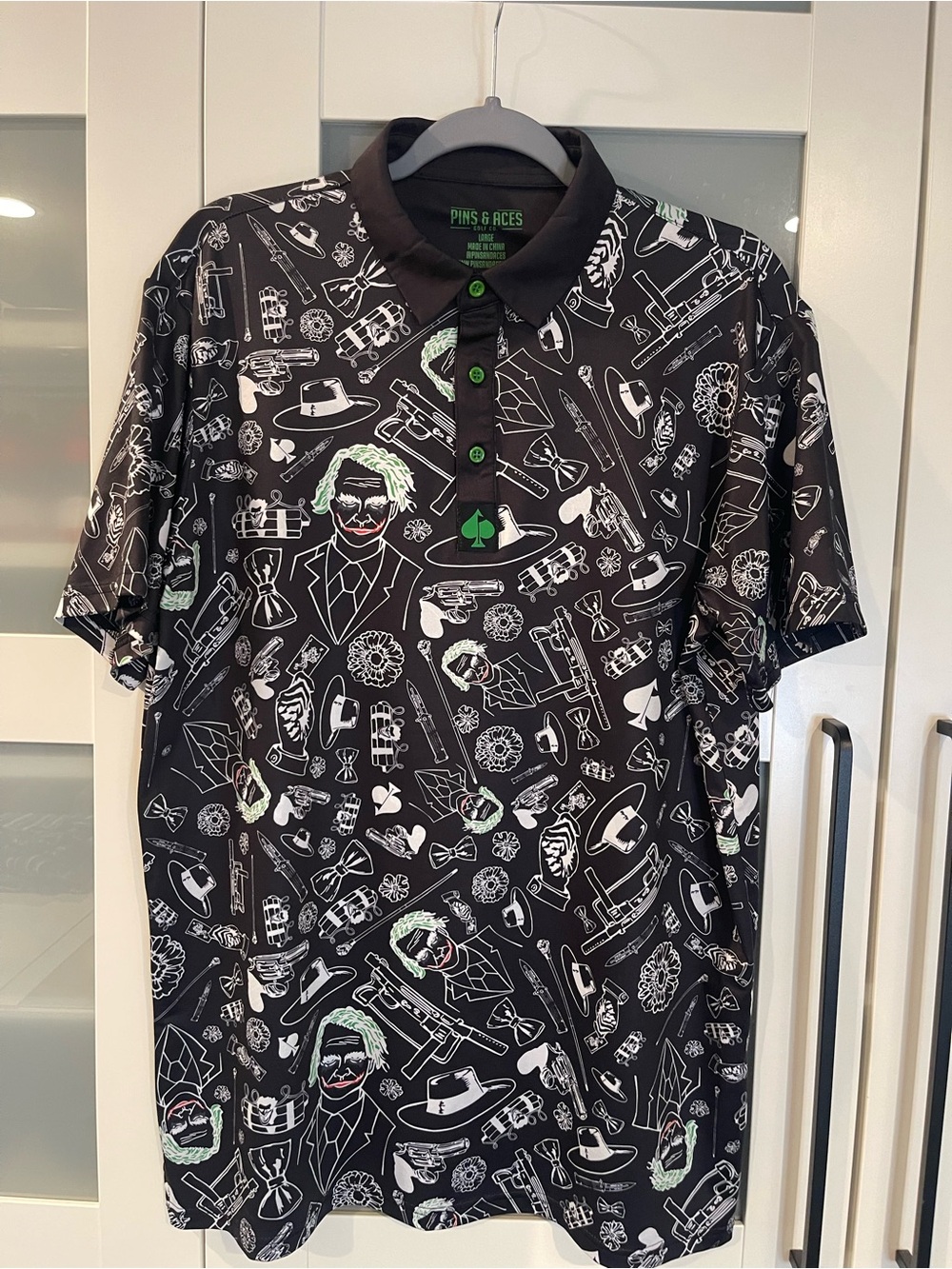 Pins & Aces Black Graphic Polo with Green Accents
